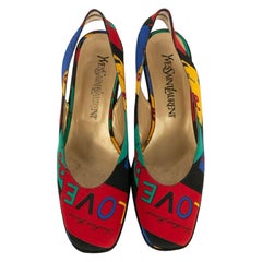 Sandalias de tacón Yves Saint Laurent de algodón estampado y piel dorada, talla 36