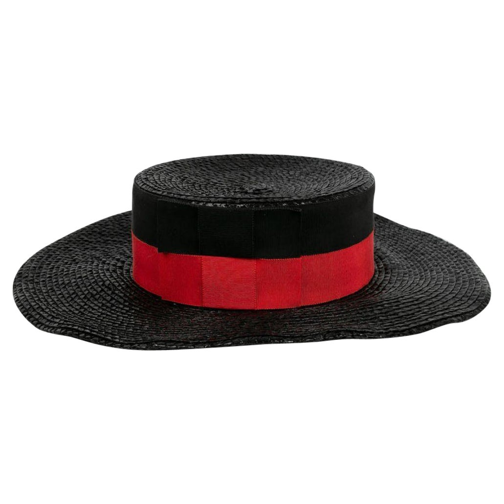 Sombrero Yves Saint Laurent con ribete trenzado