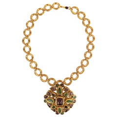 Chanel Short Necklace in Gilded Metal and Pendant Brooch