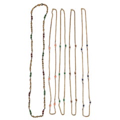 Chanel Set of Vintage Long Necklaces in Gold Metal and Glass Beads