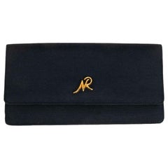 Schwarze Ottomane-Clutch von Nina Ricci