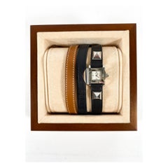 Hermès Schwarz Medor Uhr mit extra Band