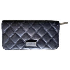 Used Chanel black quilted leather wallet 