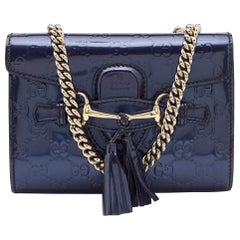 Gucci Borsa a tracolla mini Emily in pelle verniciata viola Guccissima