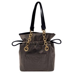 Yves Saint Laurent Vintage Metallic Canvas Drawstring Small Handbag