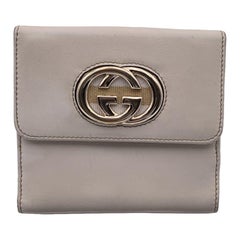 Used Gucci Light Beige Leather GG Logo Bifold Compact Wallet