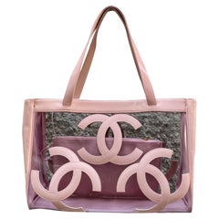 Borsa Chanel CC rosa e trasparente in pelle e pvc.