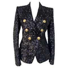Giacca Balmain con paillettes nere.