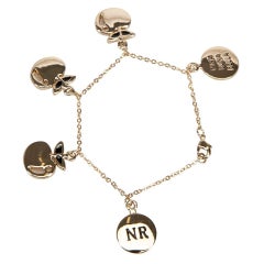 Nina Ricci Damen-Charm-Armband aus Gold mit Apfeln