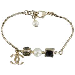 Chanel 15P Gold Bracelet with CC Charm and Pearls