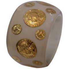 White bangle with coins