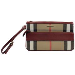 Nice Burberry Clutch in Canvas and Leather. Never Used