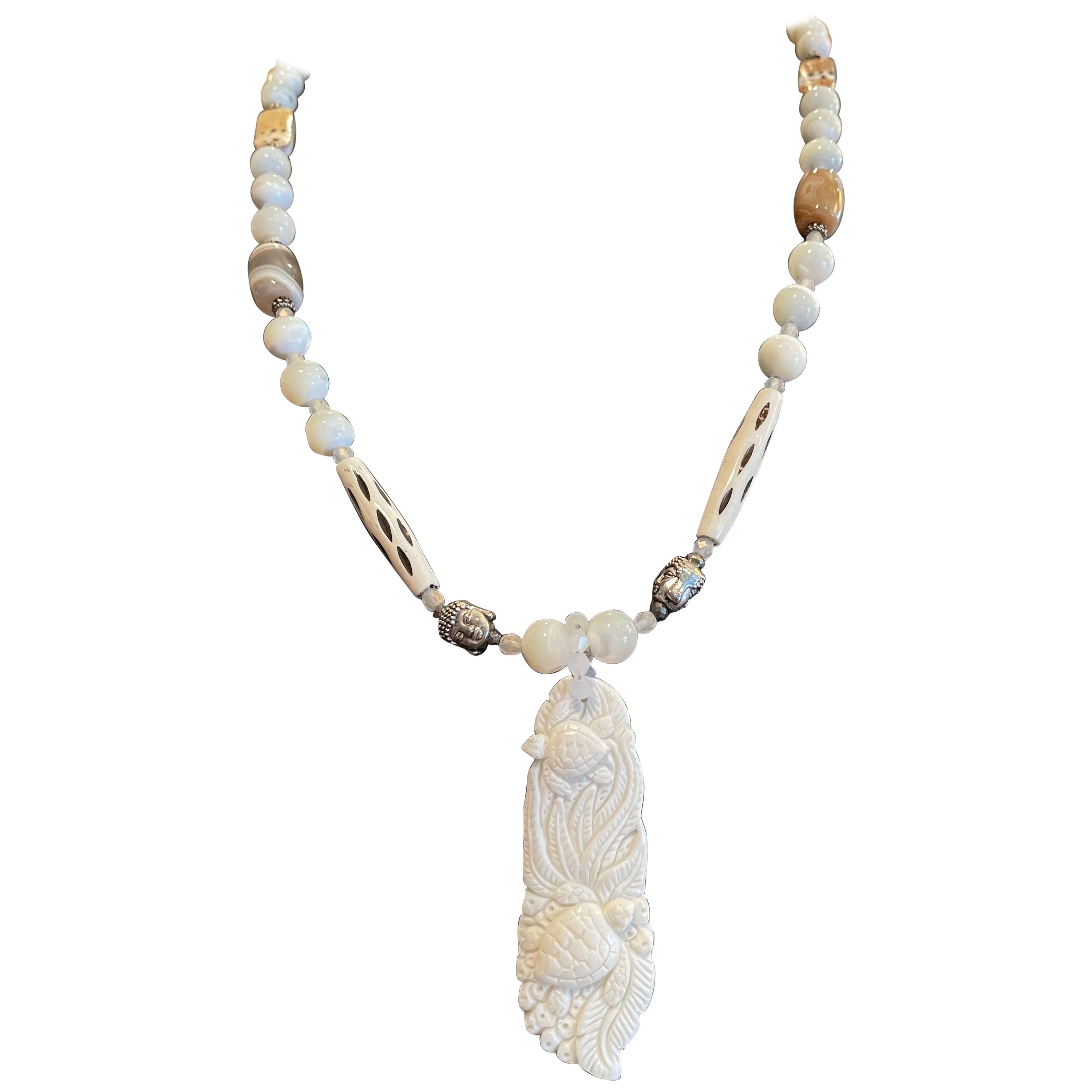 LB handmade one of a kind carved bone pendant stunning MOP necklace For Sale
