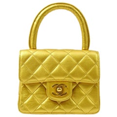 Chanel 1994 Classic Flap Handbag Micro Gold Lambskin