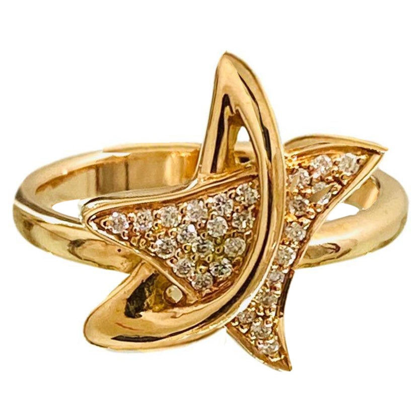 Bague étoile en or 18k et diamant en vente