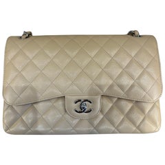 Chanel classic double flap beige caviar leather bag 