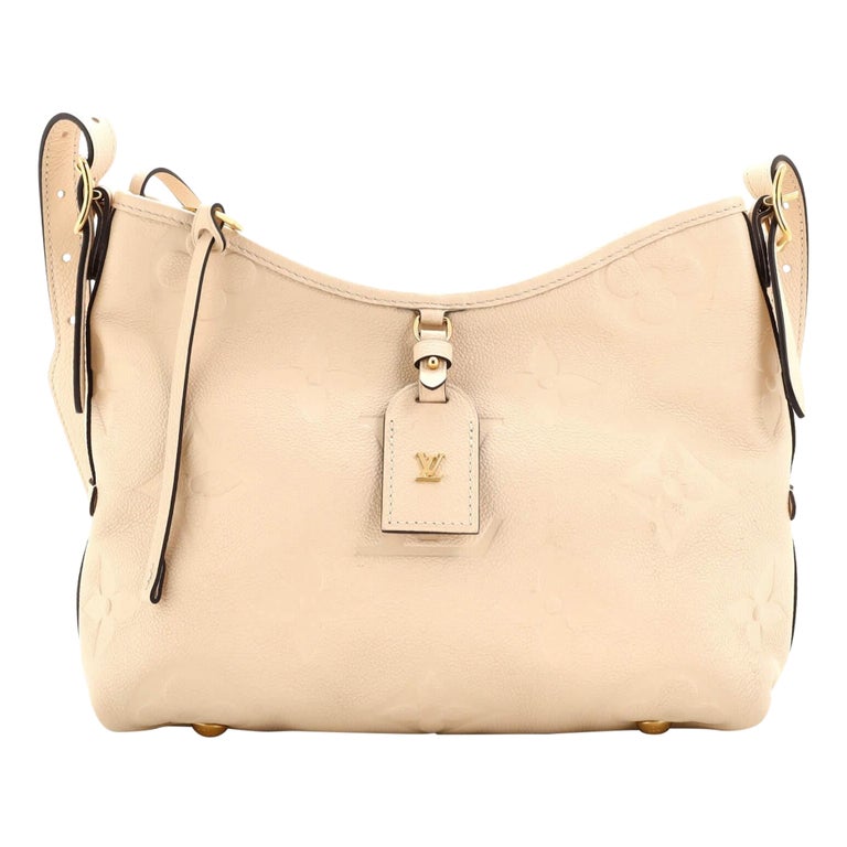 Louis Vuitton Maida Hobo Bag Monogram Empreinte Leather In Beige