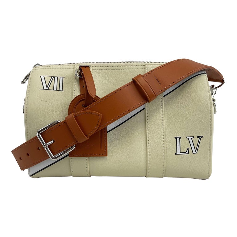 Louis Vuitton - Sac City Keepall Trunk L'oeil en cuir de veau couleur crème  En vente sur 1stDibs