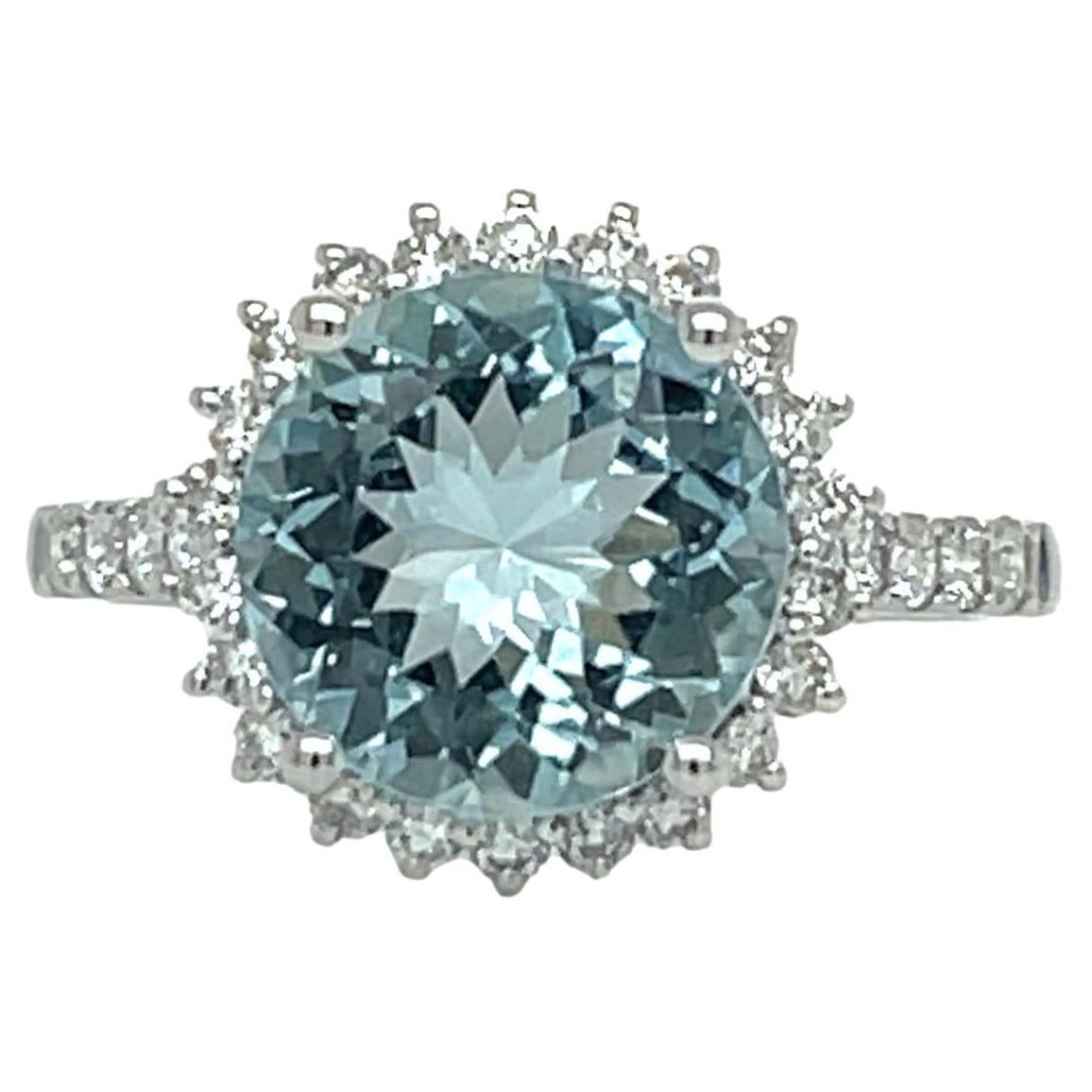 Aquamarine and Diamond Halo Ring in 14KW Gold For Sale