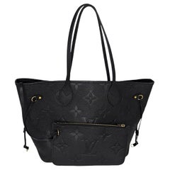 Monogram Giant Empreinte Neverfull MM & Pochette von Louis Vuitton