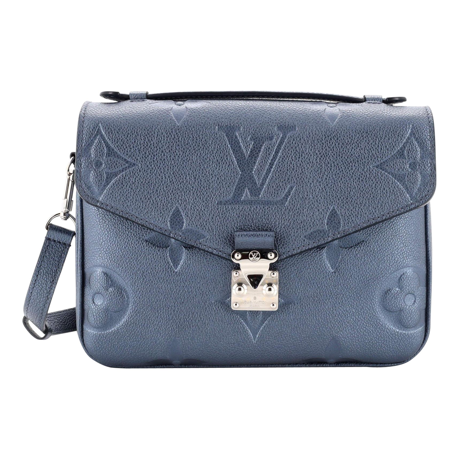 Louis Vuitton NeoNoe Handbag Limited Edition Crafty Monogram Empreinte  Giant MM at 1stDibs