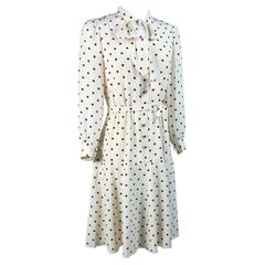 A Polka Dots crepe cocktail dress by Chanel Haute Couture numbered 59644 C. 1975