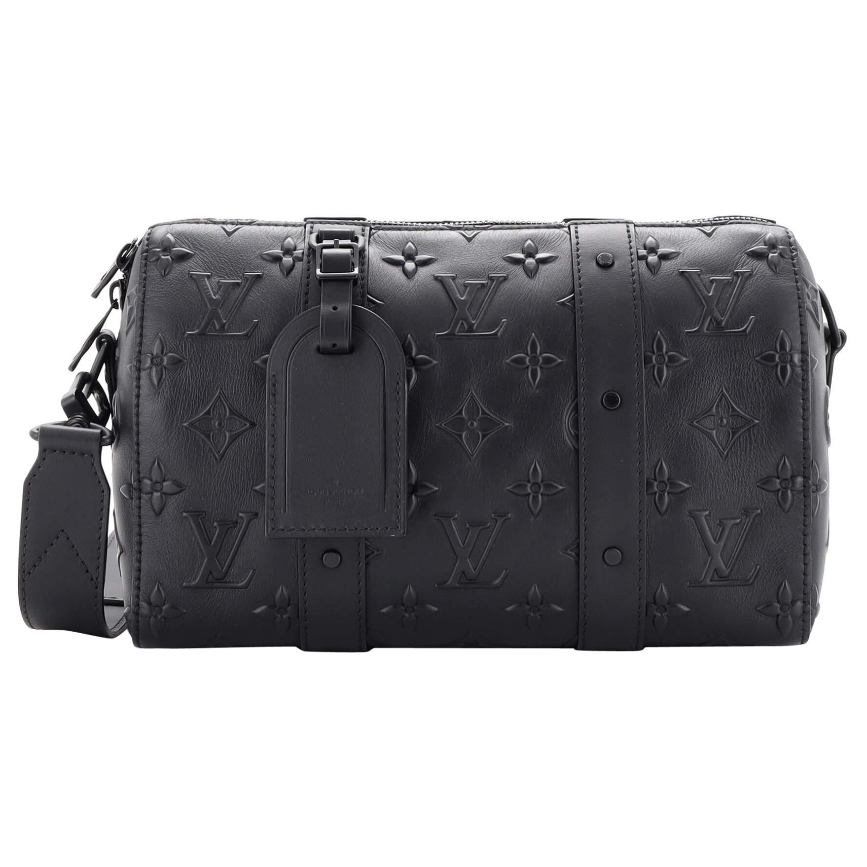 Louis Vuitton City Keepall Bag Monogram Seal Leather