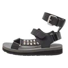 Prada Black Leather and Rubber Punk Stud Ankle Strap Flat Sandals Size 37.5