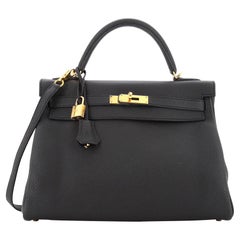 Hermès Kelly Handtasche Noir Togo mit Goldbeschlägen 32