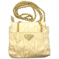 Vintage Prada quilted nylon ivory beige shoulder bag with golden chain straps