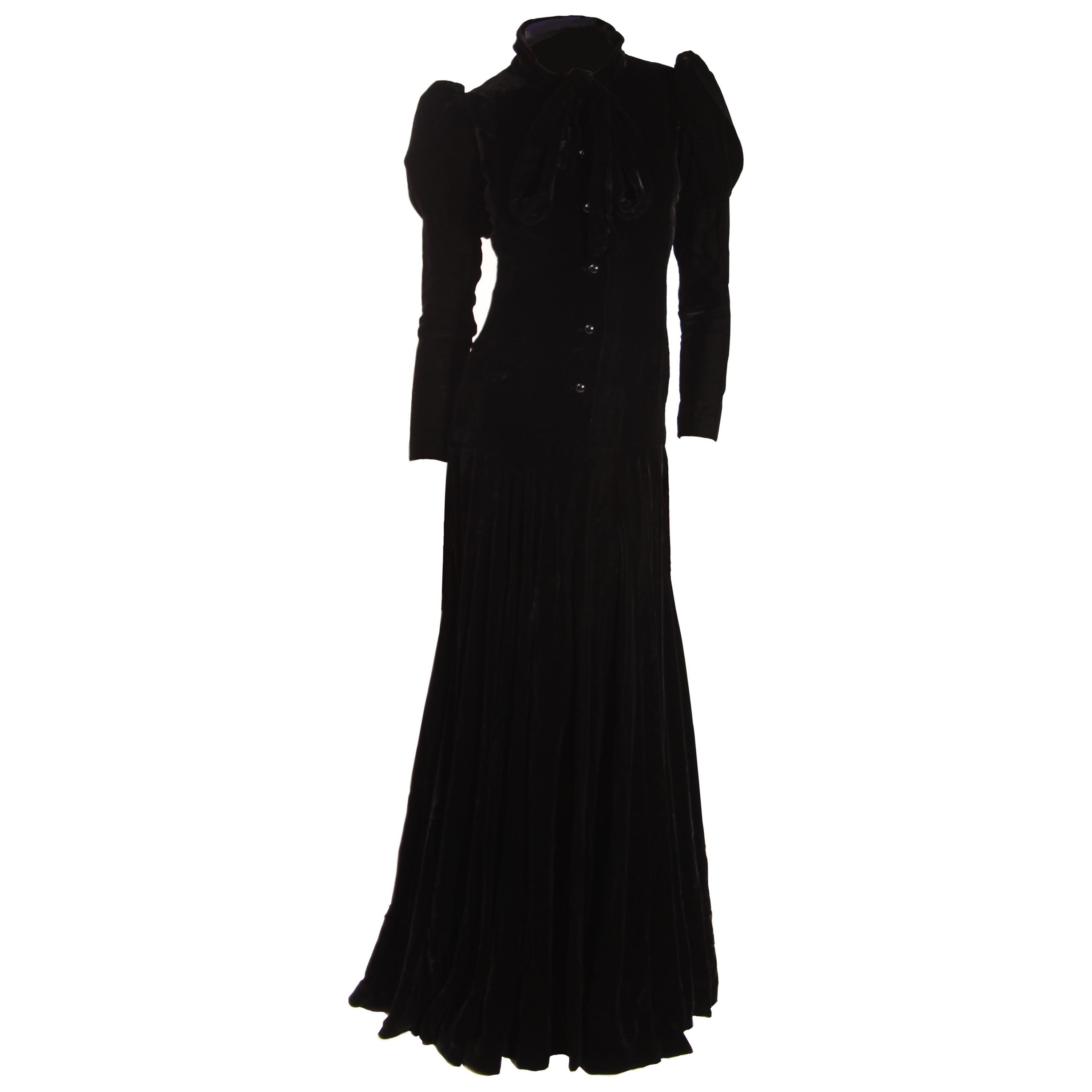 Christian Dior Paris numbered couture black silk evening gown. C. 1960s