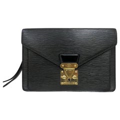 Louis Vuitton Black Leather Epi Vertical Trunk Pochette – The