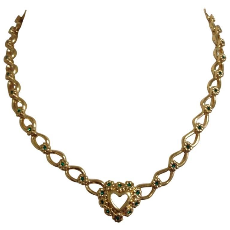 MINT. Vintage NINA RICCI necklace with heart and flower motifs, green crystals For Sale