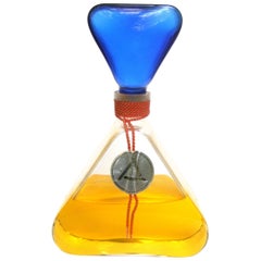 Grande bouteille factice de parfum en verre