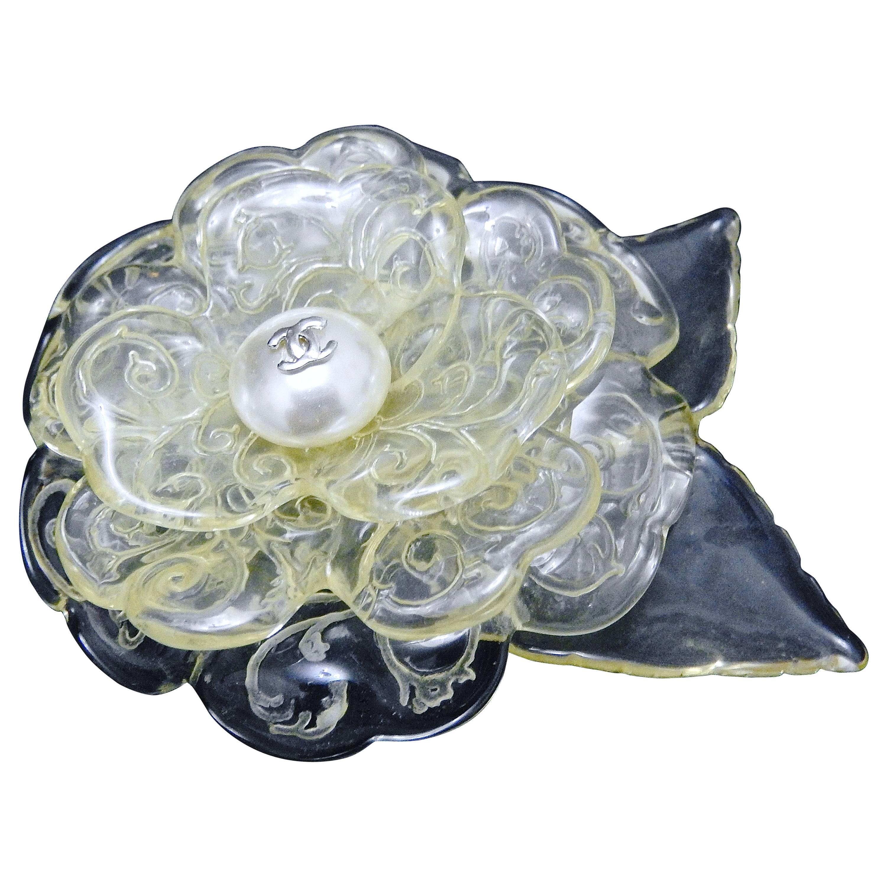 I personally love camellias from this series for their so elegant etched flowers on lucite camellia petals, and is great to go with any deep colored clothing, such as black, blue, red, purple, green etc,.
The color of the acrylic petals had turned