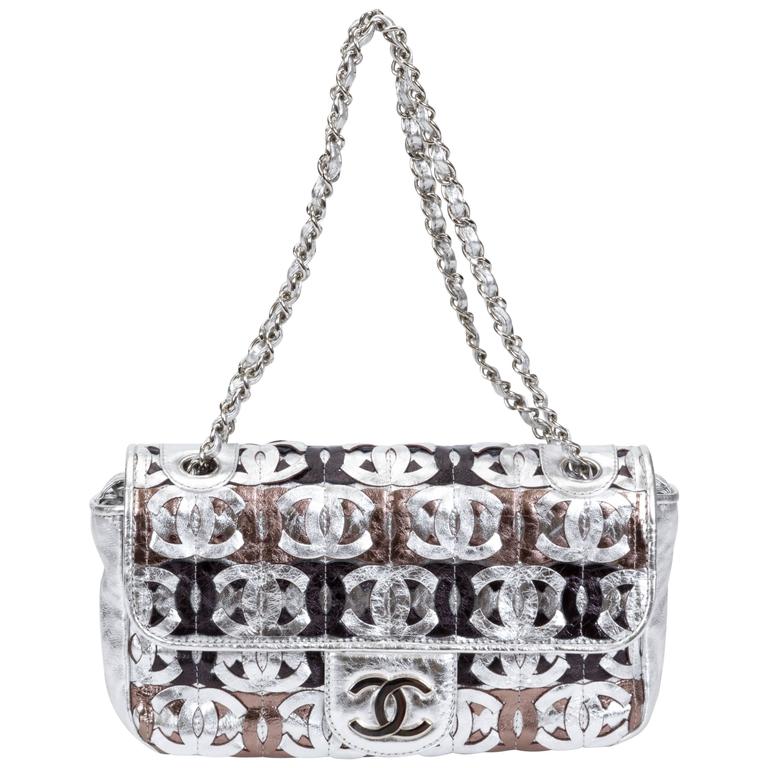 Chanel Silver Metallic Logo Evening Bag at 1stDibs