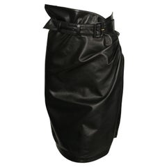 Vintage 1984 AZZEDINE ALAIA black leather wrap skirt with side buckle