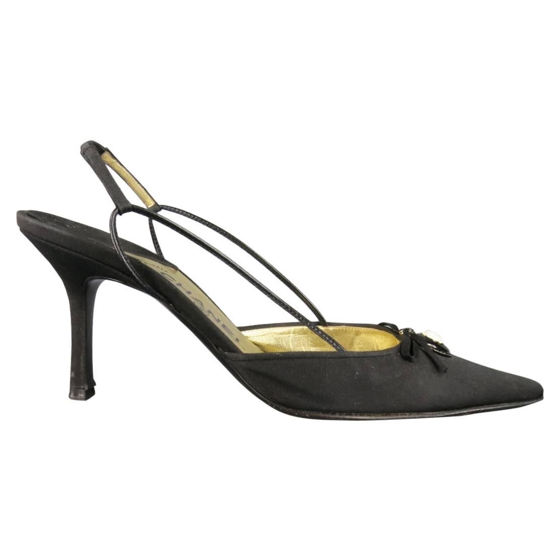 CHANEL Size 12 Black Silk White Enamel Camellia Pandant Bow Slingback Pumps