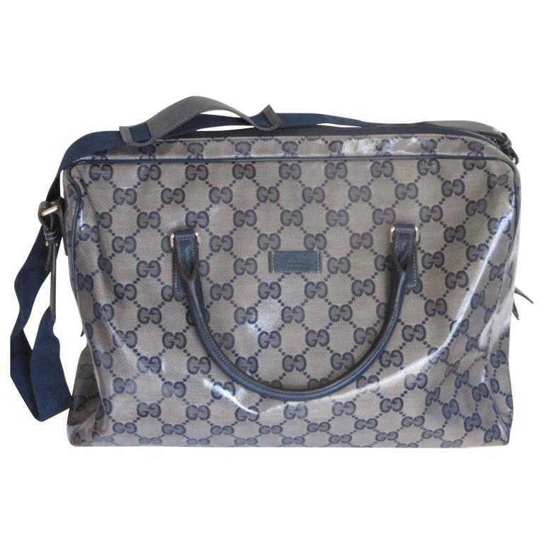 gucci coated monogram blue travel bag For Sale at 1stdibs
