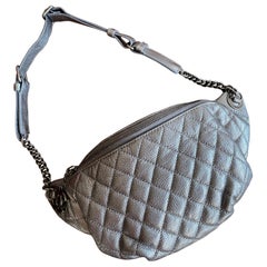 Chanel belt bag in silver leather.