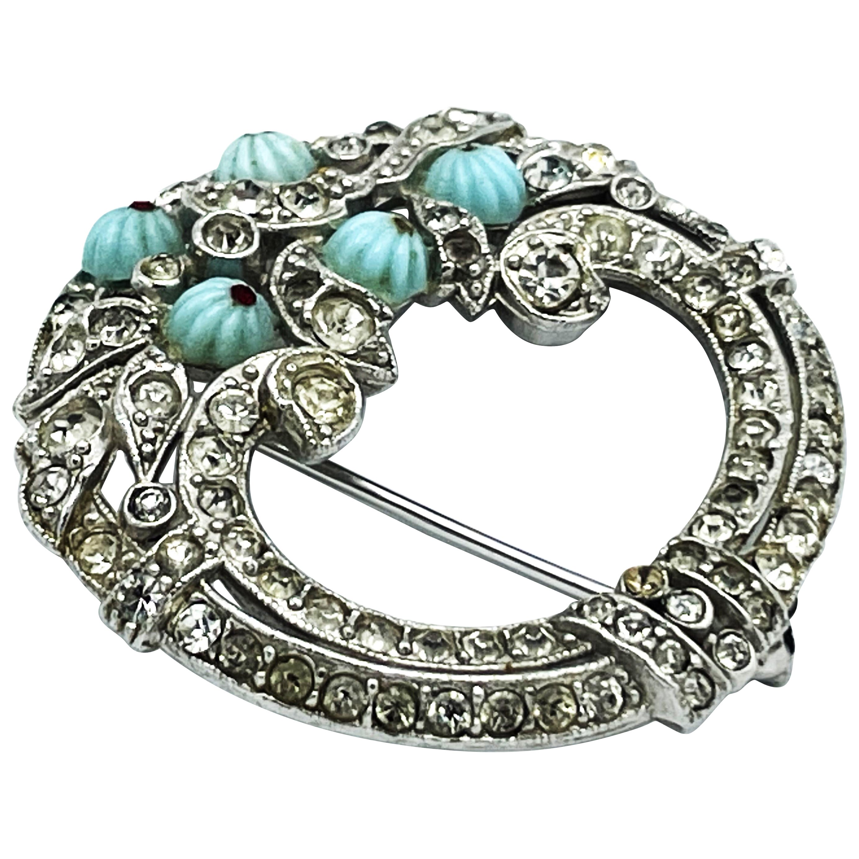 Deco Brooch in the shape of a circle, set with small rhinestones, USA 1940s  For Sale