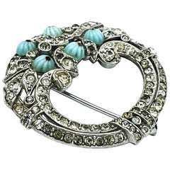 Vintage Deco Brooch in the shape of a circle, set with small rhinestones, USA 1940s 