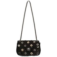 Chanel black quilted flap bag with decorative Chanel eyelets, circa 2007 12