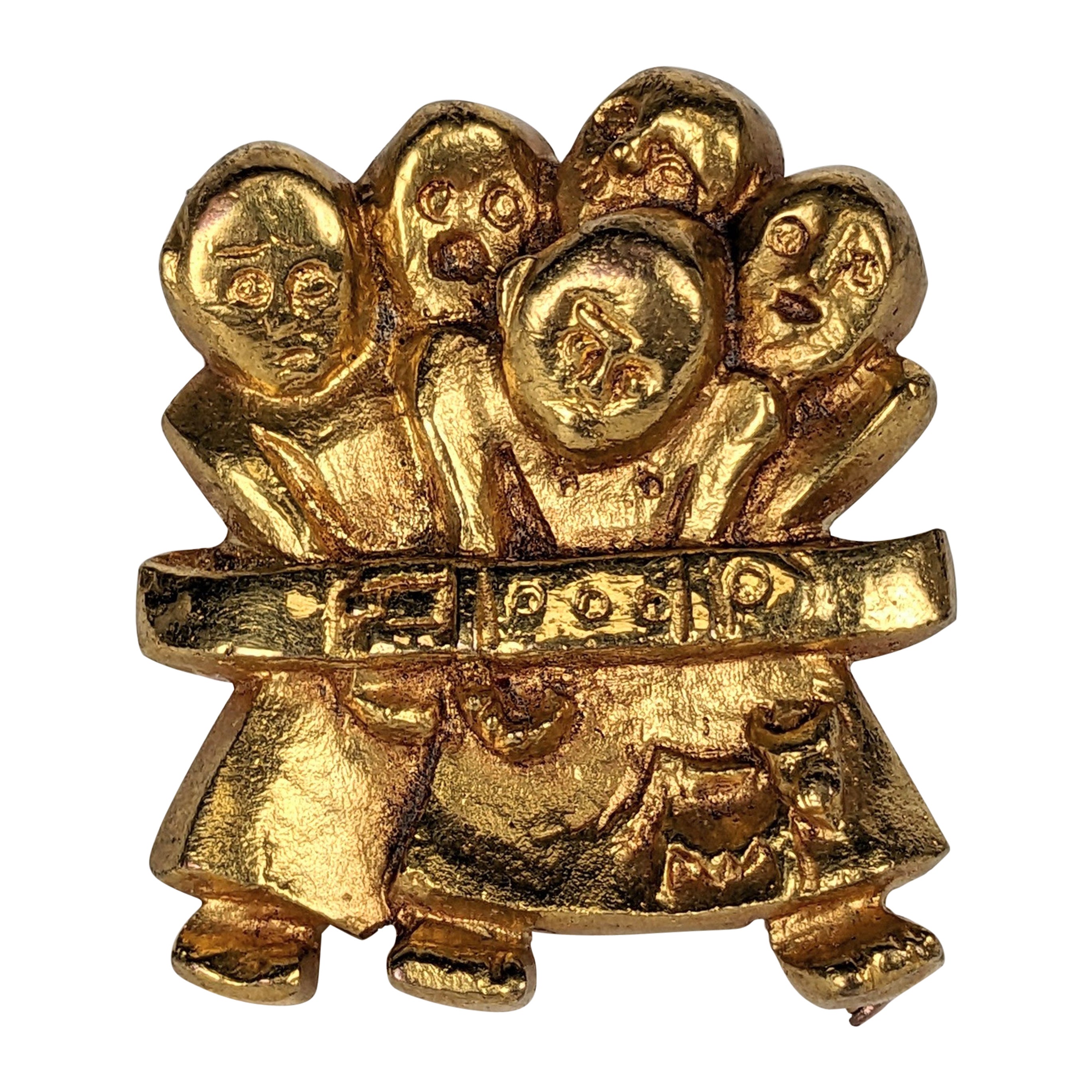 Line Vautrin "La Manif" Gilt Bronze Brooch For Sale