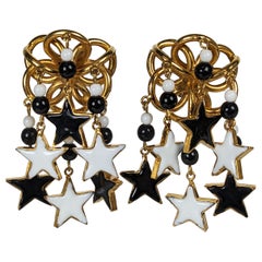 Rare boucle d'oreille Maison Gripoix for Yves Saint Laurent Star