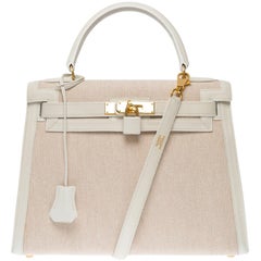 Vintage Hermès Kelly 28 sellier handbag strap in White canvas and Beige leather, GHW