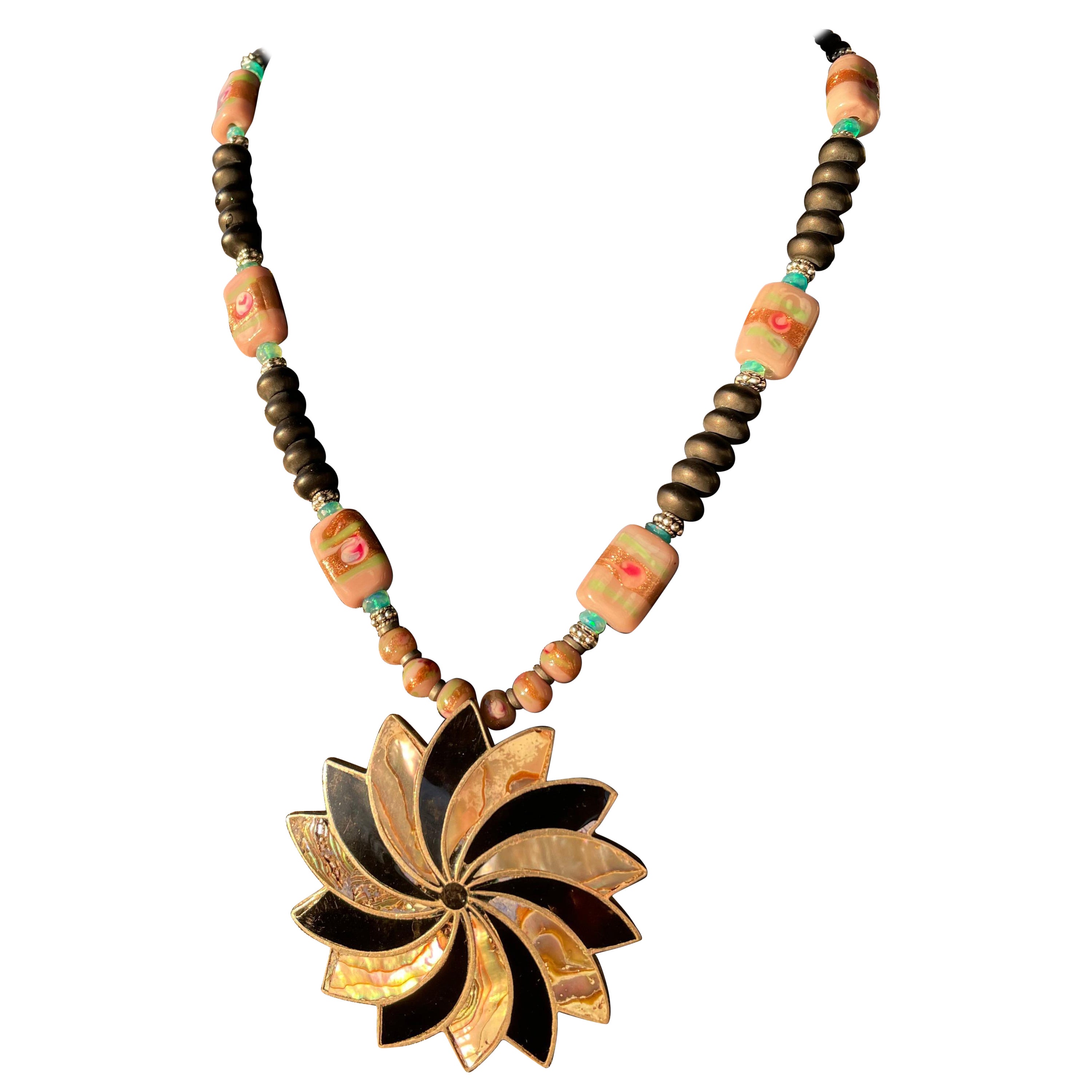 LB vintage Mexican Pinwheel pendant Stunning Venetian beads Lava stone necklace  For Sale