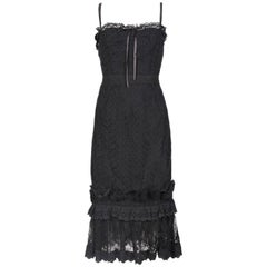 Dolce & Gabbana Schwarzes Bustierkleid aus Ösen-Spitze mit Rüschensaum