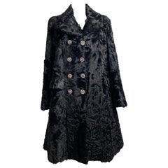 Dolce and Gabbana black astrakhan fur coat.