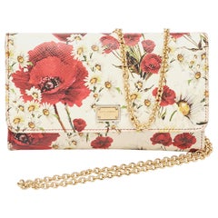 Dolce & Gabbana Mehrfarbige dreifache Brieftasche aus Leder mit Blumendruck und Lederbesatz an Kette